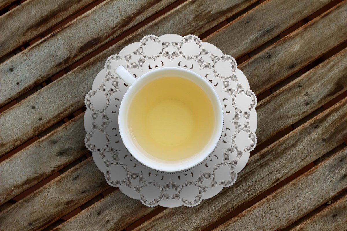 Teapoy branded doily